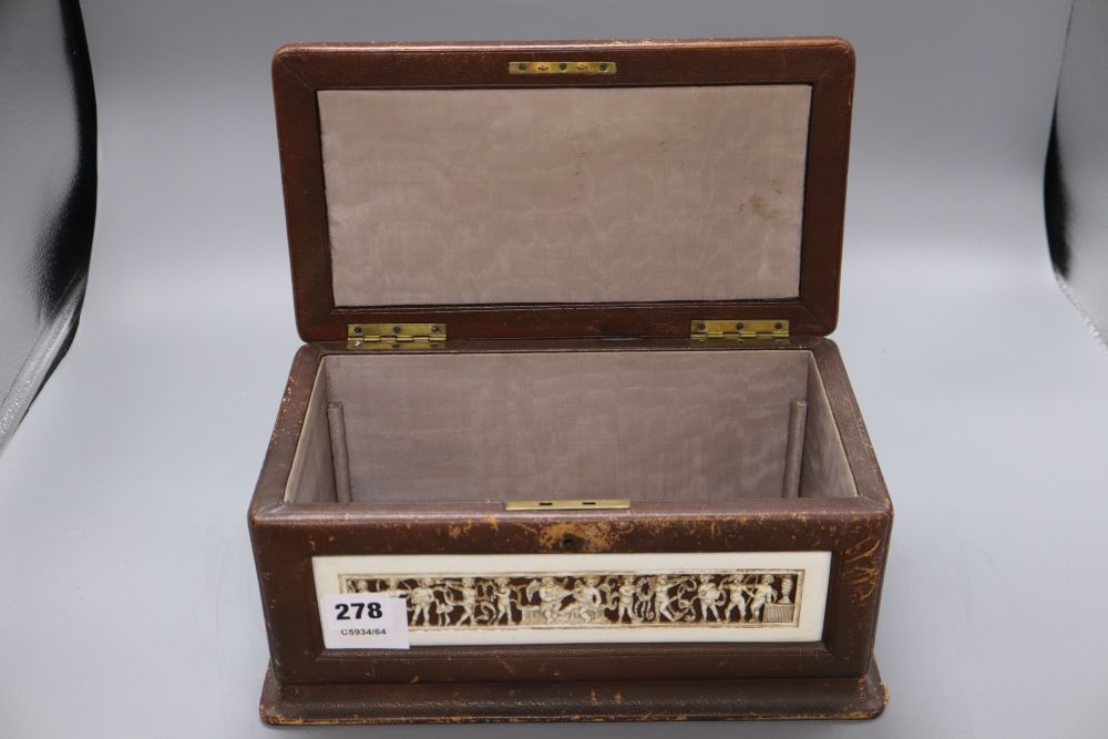 A neo-classical style ivory mounted leather casket, length 31cm